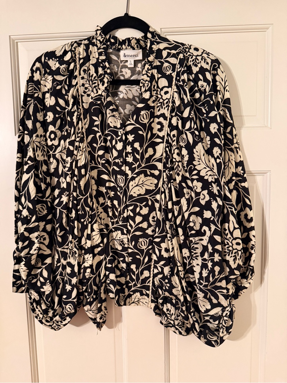 &merci Black and Cream Floral V-Neck Blouse with Draped Sleeves